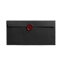 Black long business envelope with wax seal